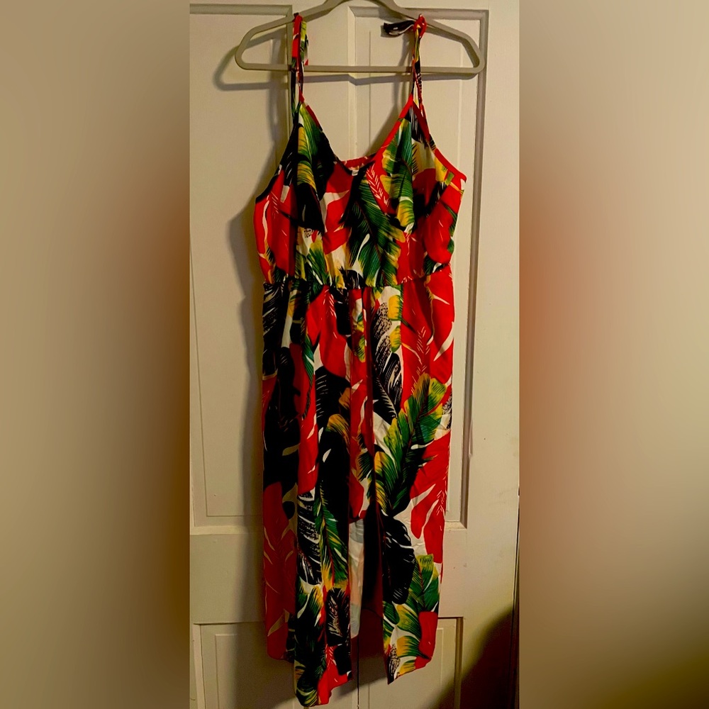 Tropical ties at shoulder and shorts.